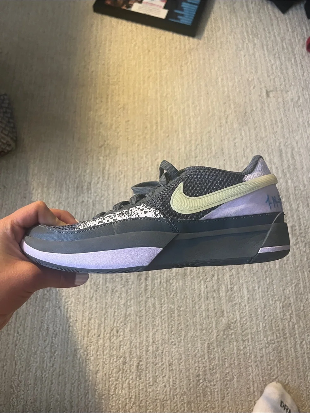 Nike Kids Black basketball shoes with Lavender and Pale Yellow Accents